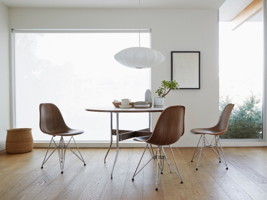 Eames Moulded Wood chair on wide base with Nelson bubble pendant Eames Moulded woods chair on chrome base, Eames Moulded wood chair on 4 leg base, Eames Fibreglass chair