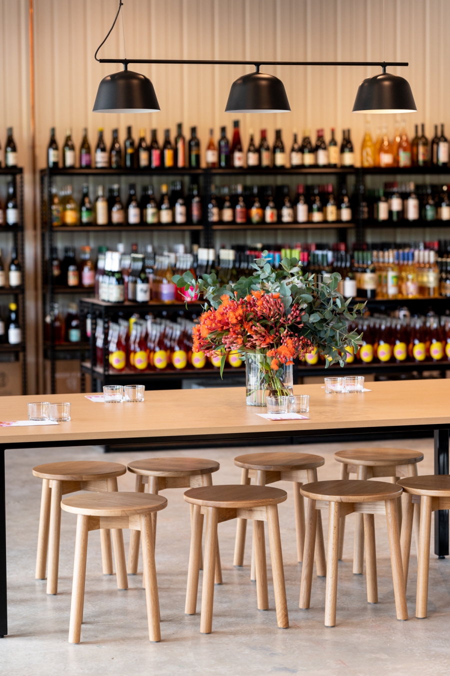 Designcraft Custom Table, Fable Oak Low Stool and Muuto Ambit Rail Lamp at Paranormal Wines, Canberra Paranormal Wines Campbell Canberra, Paranormal Wines Wine shop Canberra
