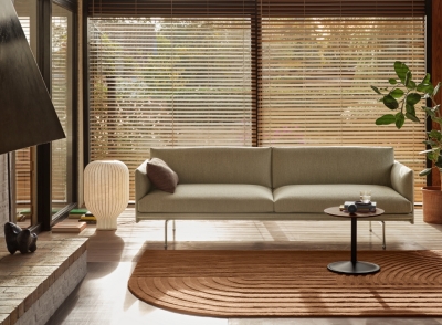 Outline Sofa, Soft Side table, Relevo rug and Strand table lamp all by Muuto